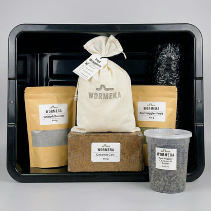 Wormera red wiggler composting kit with various components in a black bin